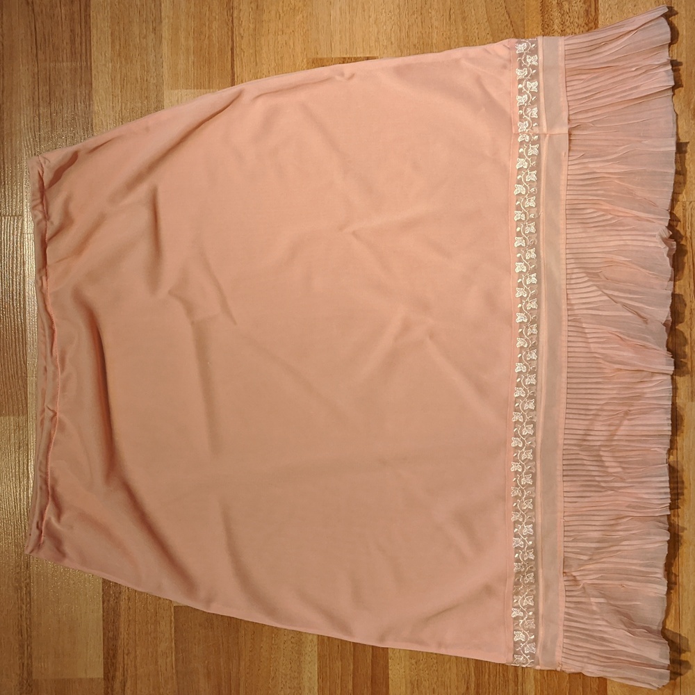 Vintage pink half slip with accordion lace hem